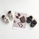 Bunny Bootees and Hat by Stella Ackroyd for Erika Knight's British Blue Wool